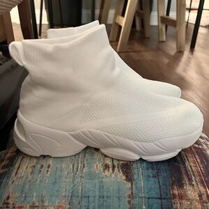 Never worn- white slip on sneakers!